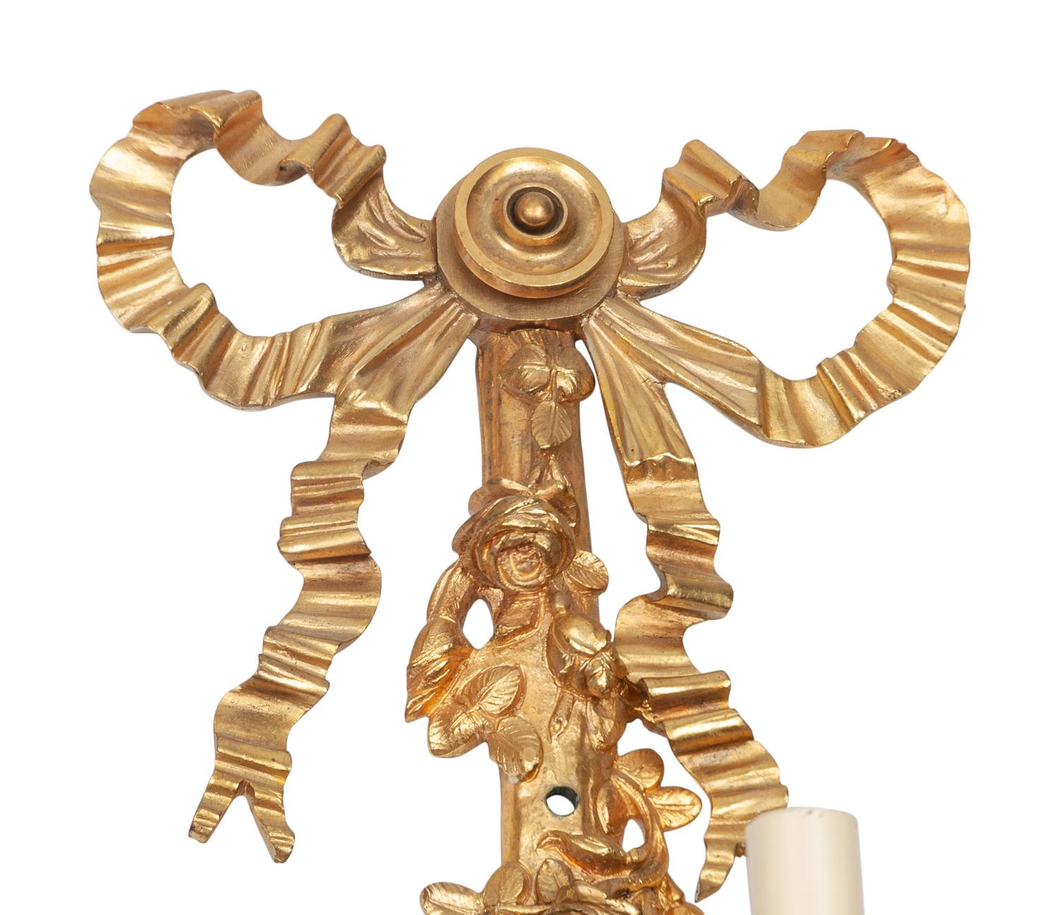 A Pair of Louis XVI Style Gilt Bronze Three-Light Sconces