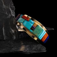 Darryl Edwards (American, 20th century) — 14K Gold and Cobblestone Inlay Cuff Bracelet