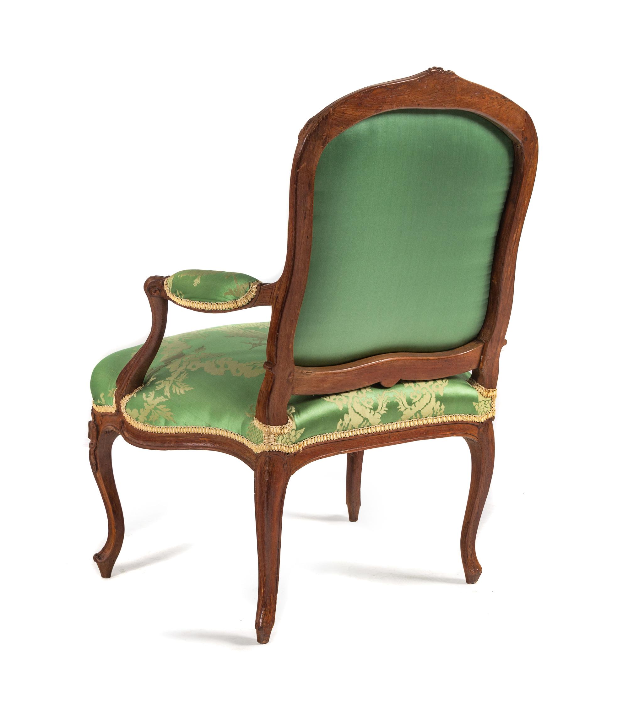 A Pair of Louis XV Beechwood Fauteuils