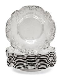 A Set of Twelve American Silver Martelé Coffee Cups and Saucers