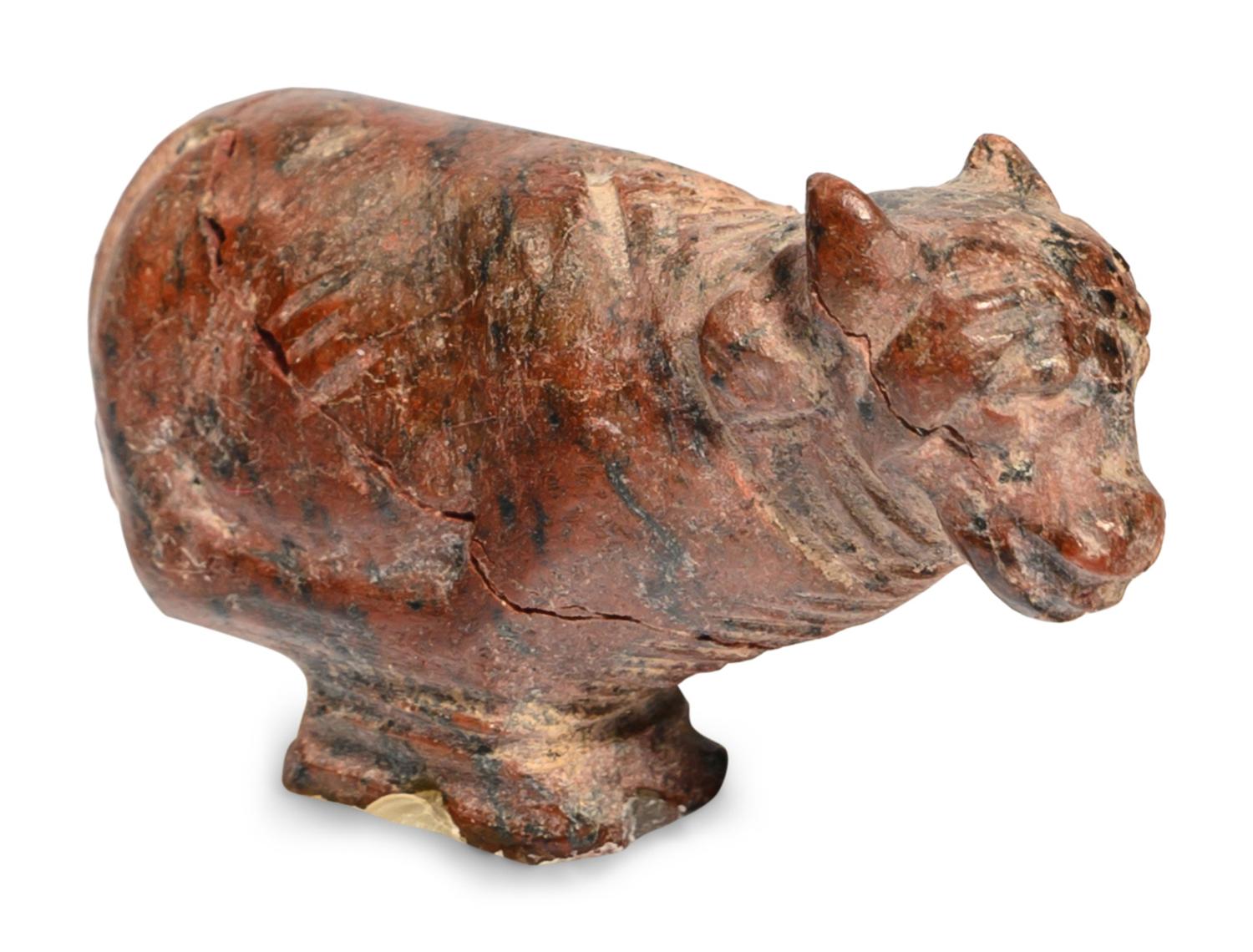 An Egyptian Red Jasper Trussed Cow