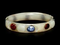 A Hardstone Inset White Jade Bangle