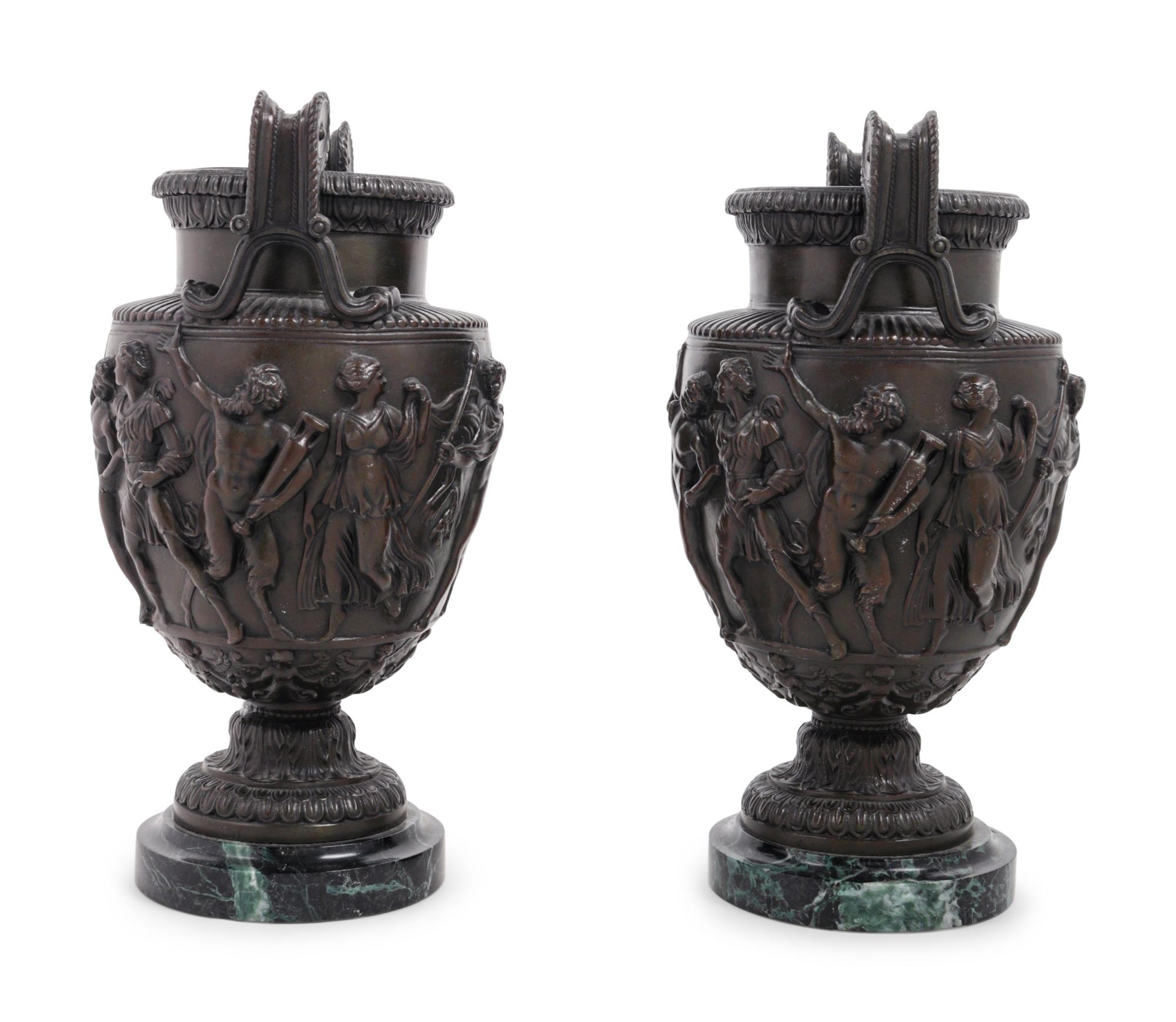 A Pair of Grand Tour Cast Metal and Marble Urns