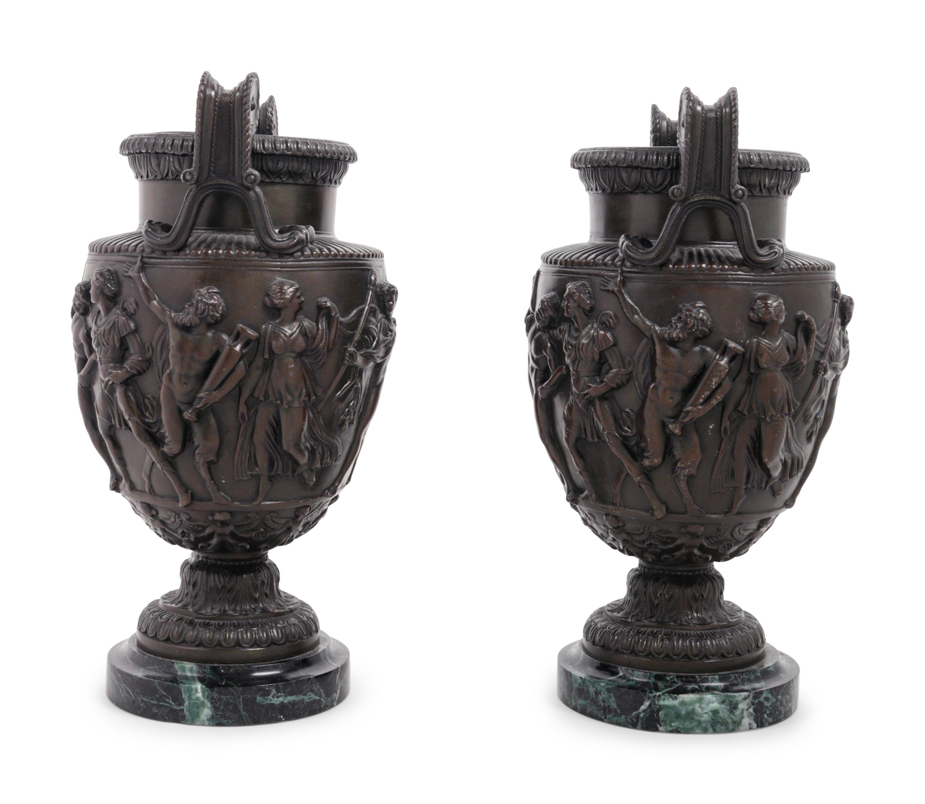 A Pair of Grand Tour Cast Metal and Marble Urns