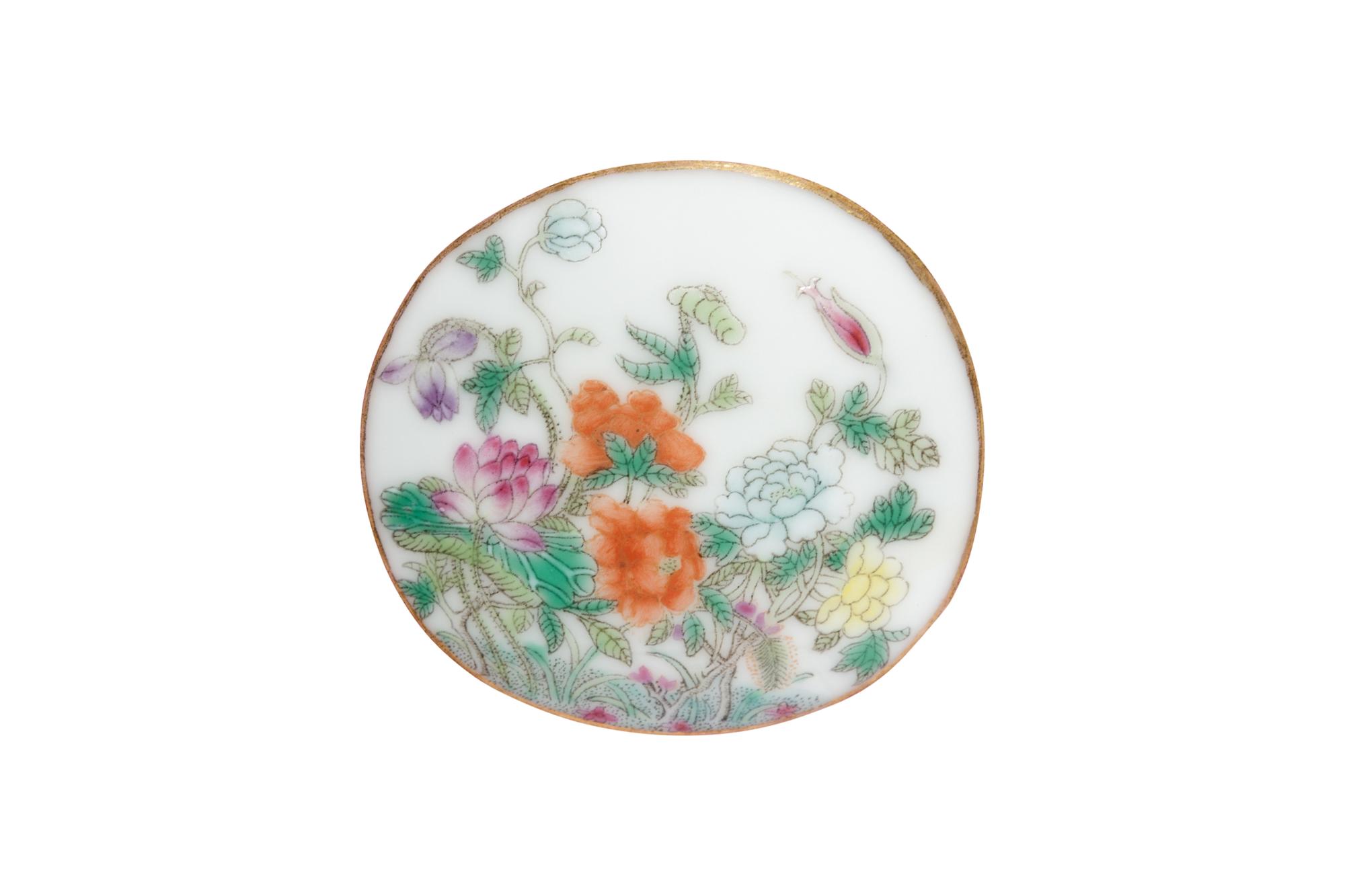 A Ruby Sgraffito Ground Famille Rose and Underglaze Blue Porcelain Bowl