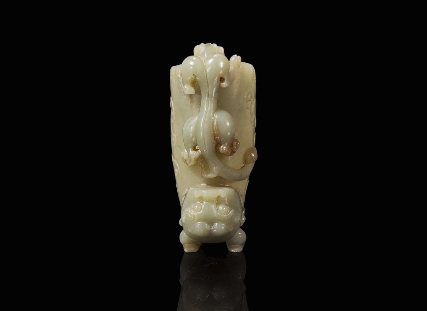 A Chinese carved celadon jade rhyton 玉爵杯