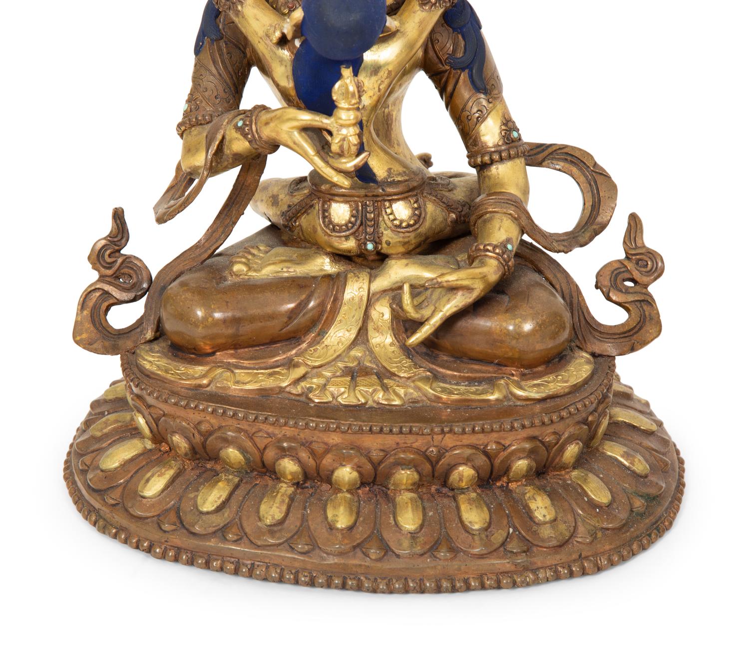 A Group of Three Tibetan Polychromed Brass Deities