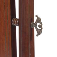 A Regency Mahogany and Brass-Inlaid Cheval Mirror