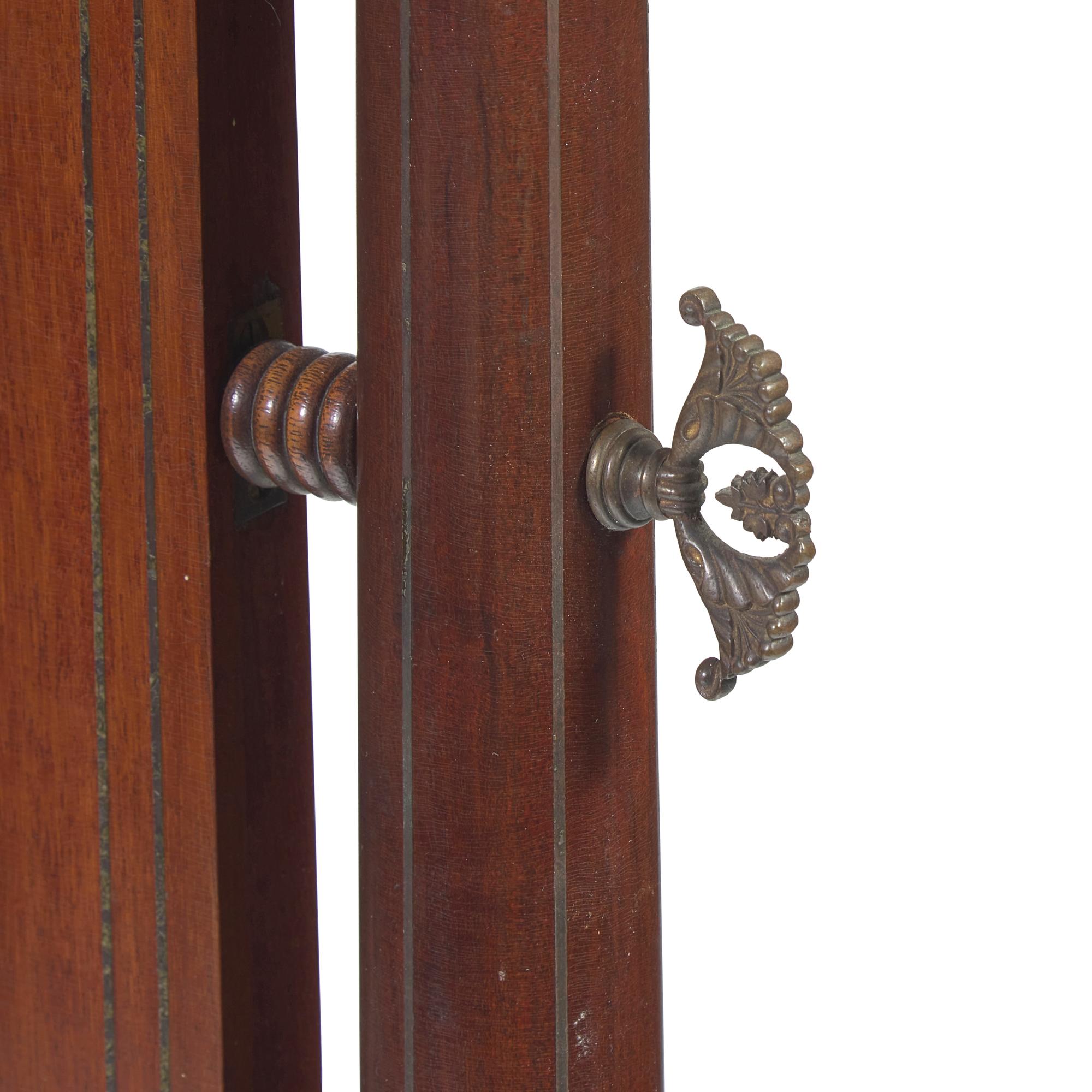 A Regency Mahogany and Brass-Inlaid Cheval Mirror