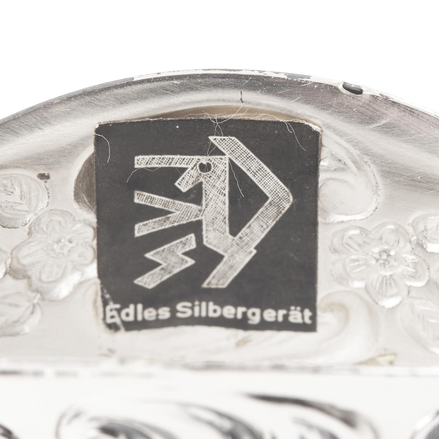 A Set of Twelve German Silver Napkin Rings