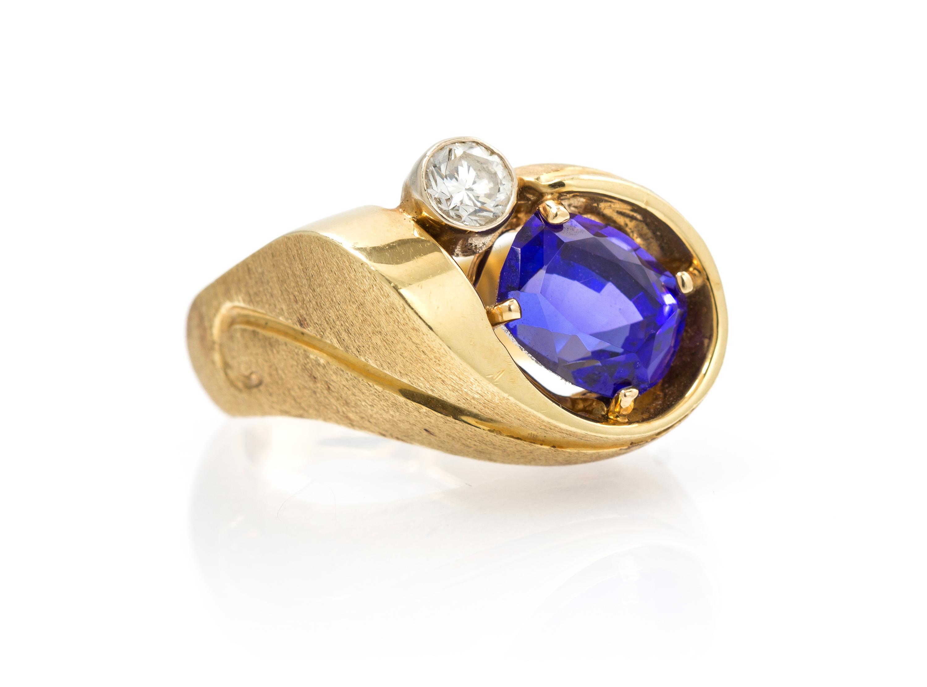 A Yellow Gold, Tanzanite and Diamond Ring, 18.50 dwts.