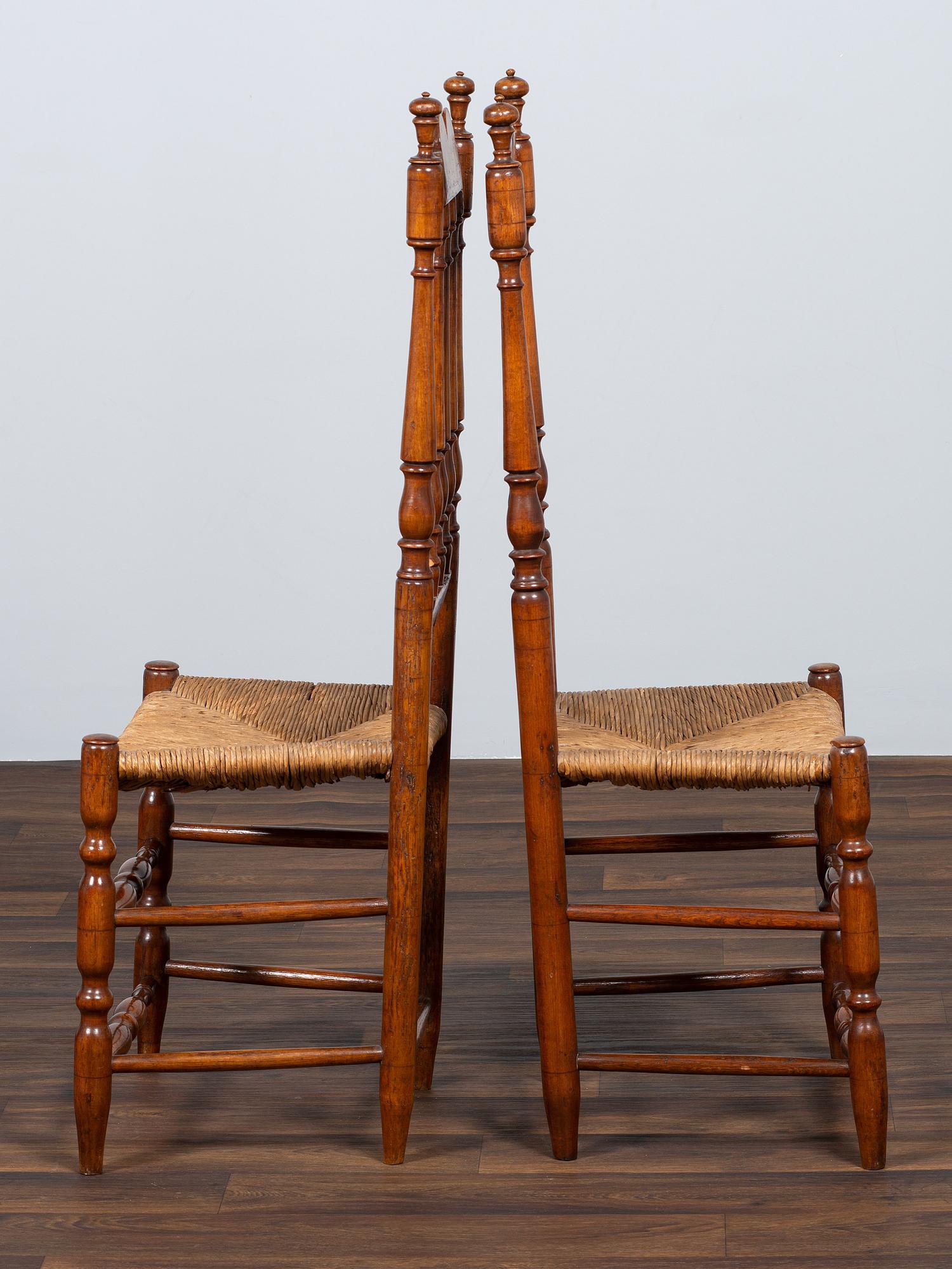 A Pair of William and Mary Bannister-Back Rush Seat Side Chairs
