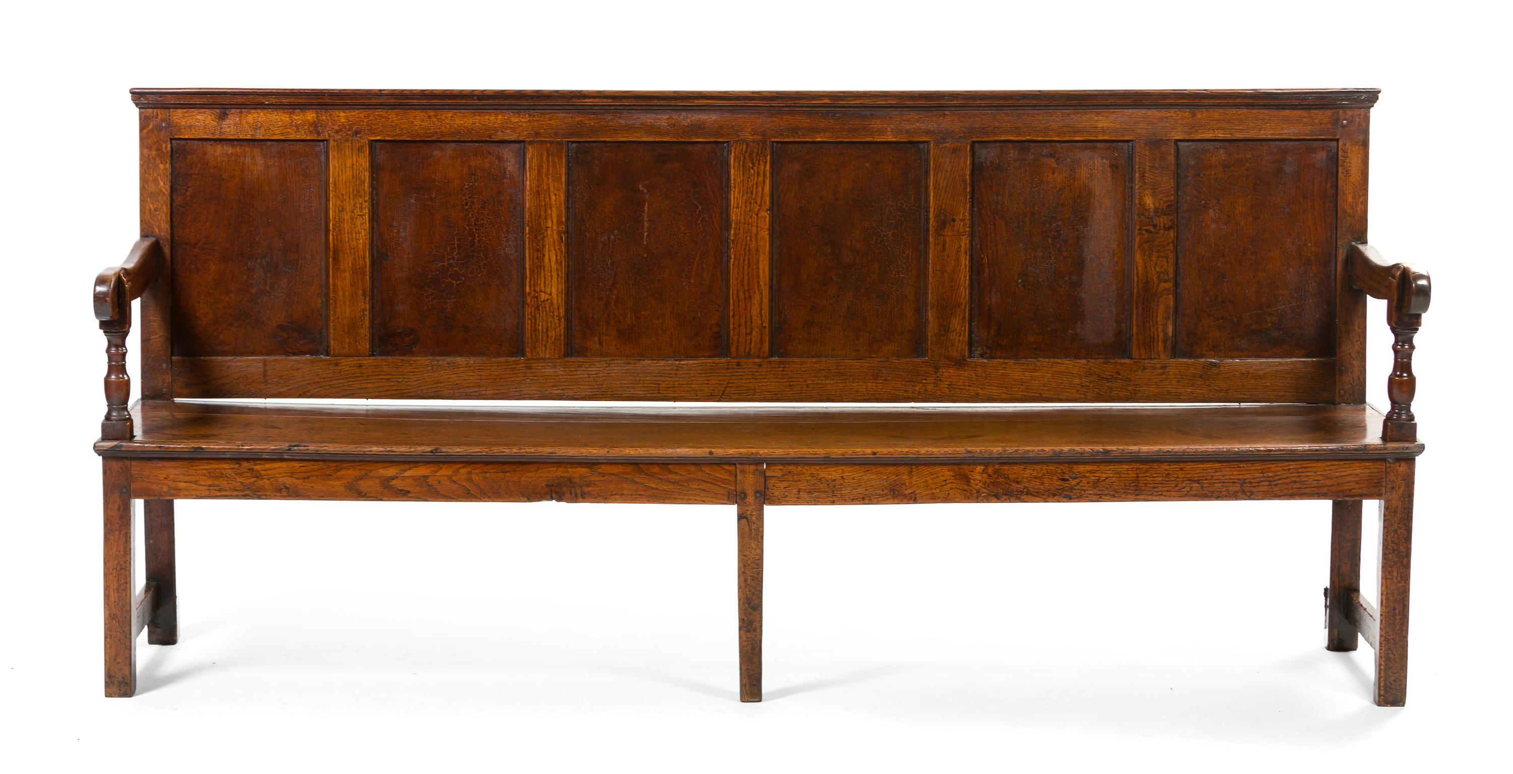 An English Provincial Oak Bench, Height 37 1/2 x width 82 1/2 x depth 17 inches.
