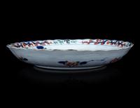 A Pair of Chinese Export Imari and Famille Rose Porcelain Covered Jars and a Flori-Form Plate