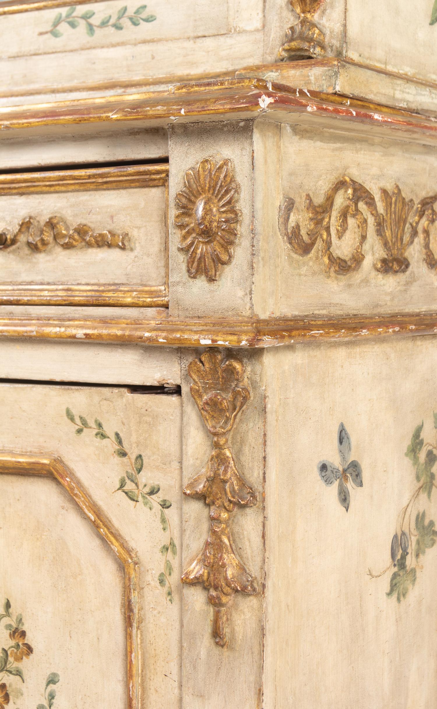An Italian Polychrome and Cream-Painted and Parcel-Gilt Cabinet