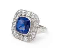 A Platinum, White Gold, Synthetic Sapphire and Diamond Ring,