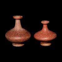 Two Capuli Polychrome Bottles