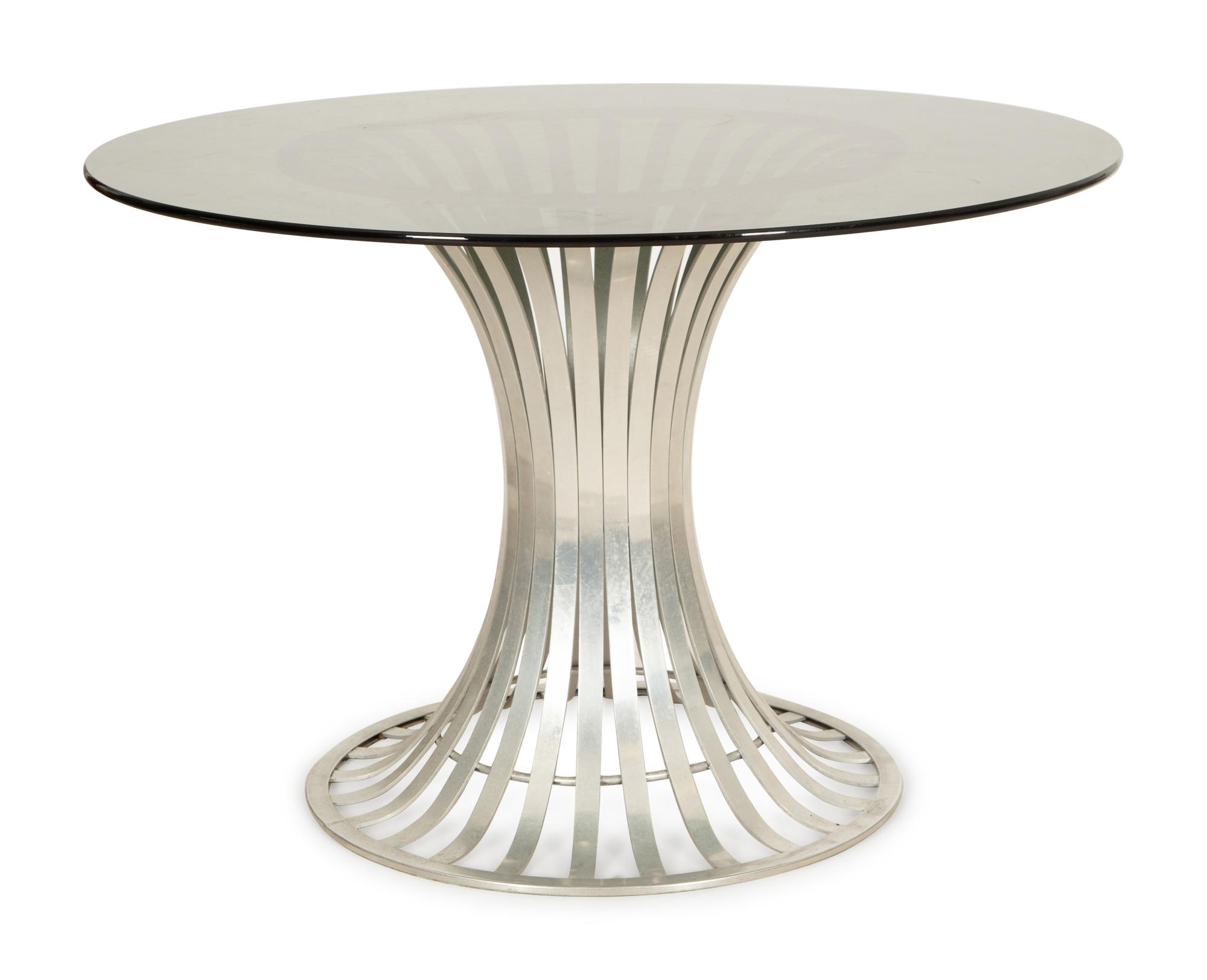 A Russell Woodard Dining Table with Four Chairs