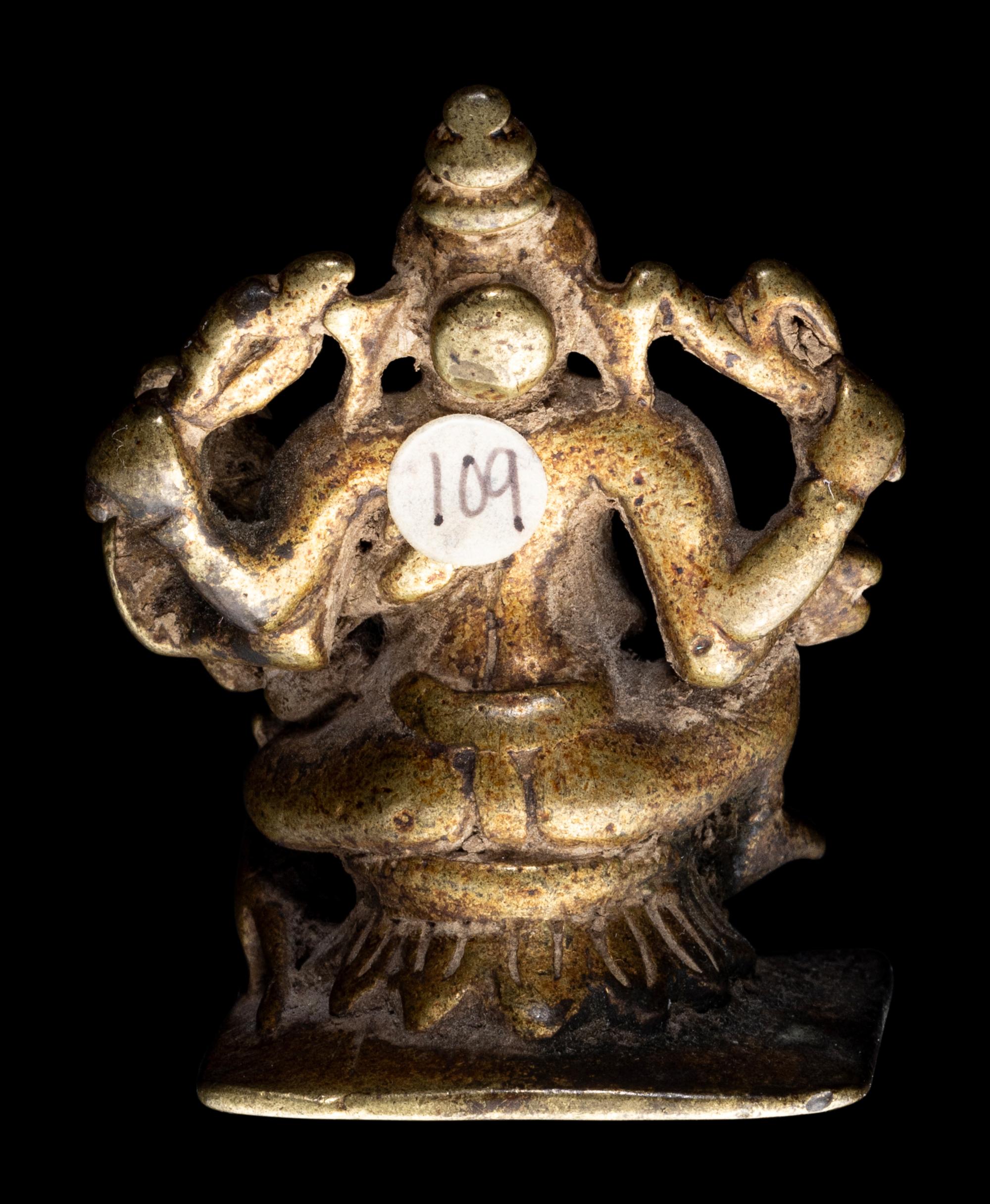 A Small Indian Brass Figural Group of Ganesha and Shakti
