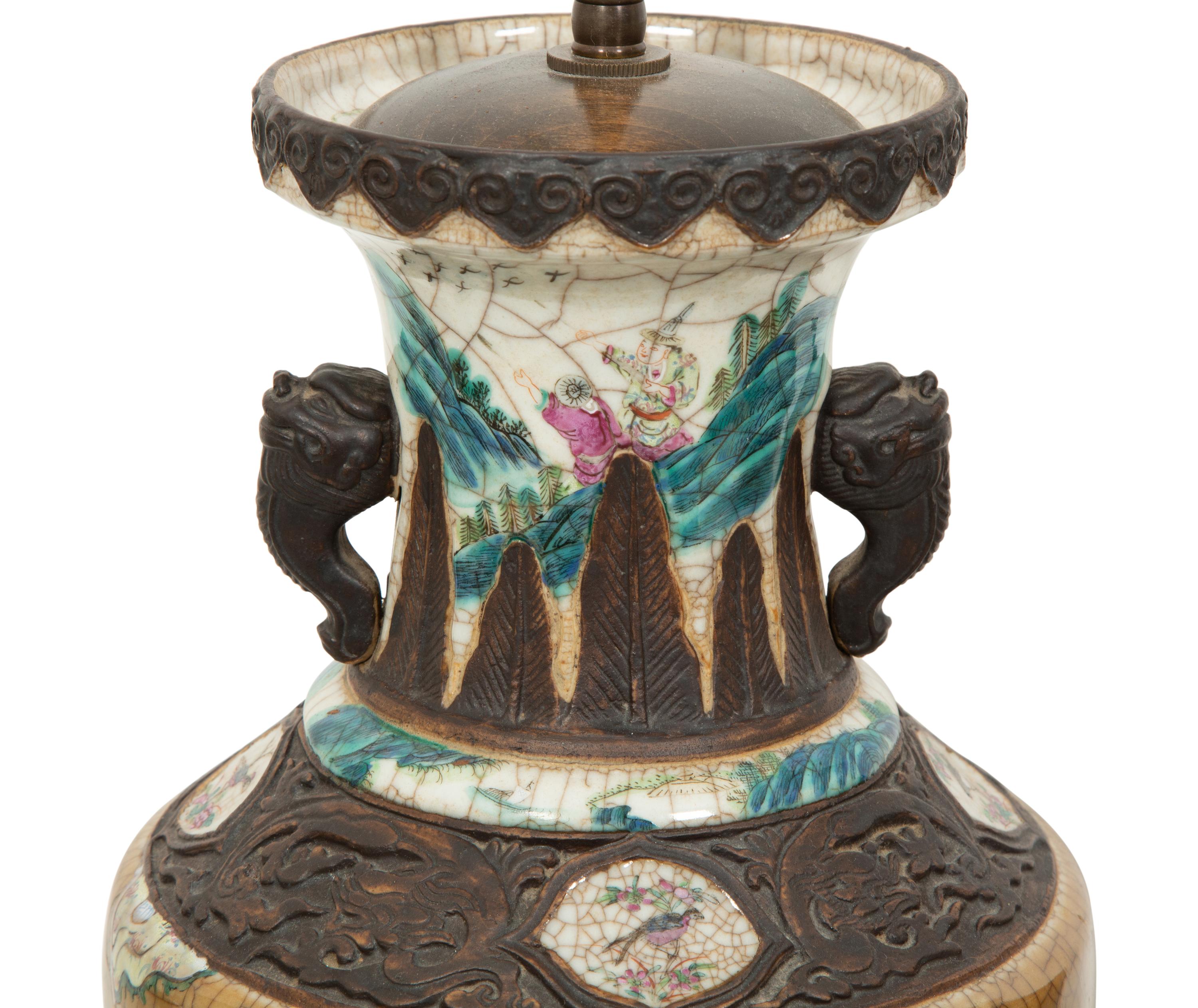 A Pair of Chinese Glazed Ceramic Vases Mounted as Lamps