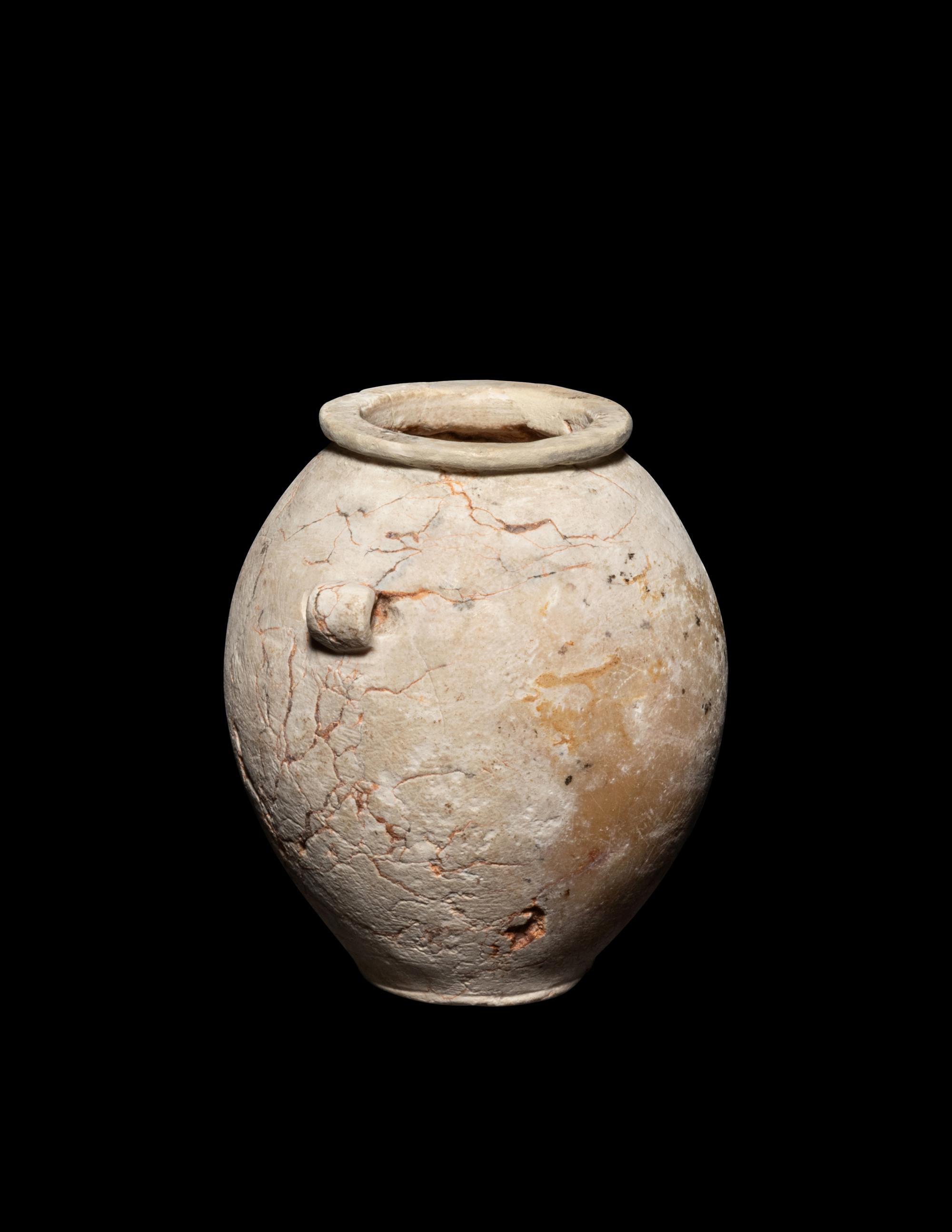 An Egyptian Miniature Limestone Lug Handled Jar