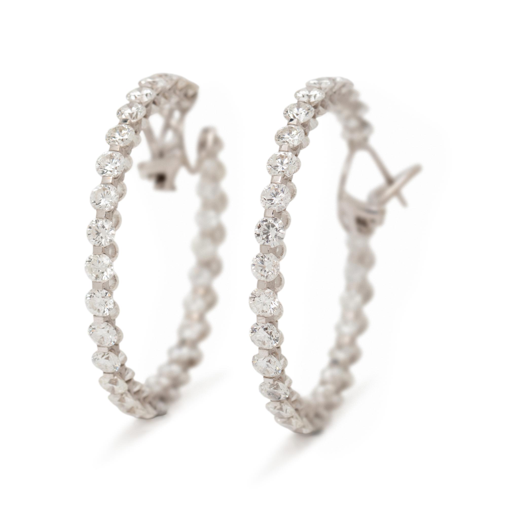 CHOPARD, DIAMOND AND WHITE GOLD INSIDE-OUT HOOP EARRINGS