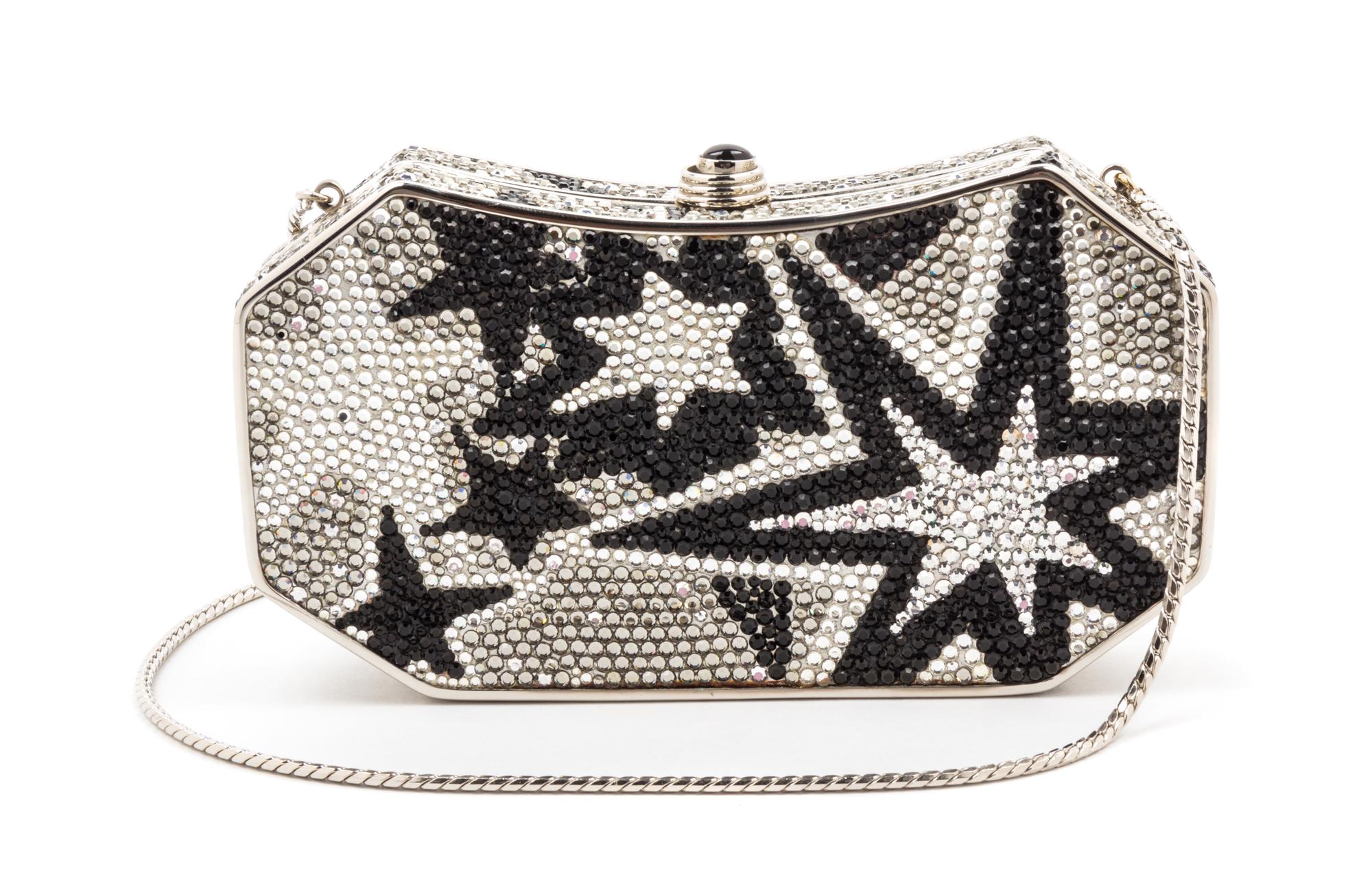 A Judith Leiber Black and Silver Crystal Minaudiere, 6.5" x 3.75" x 1.75".