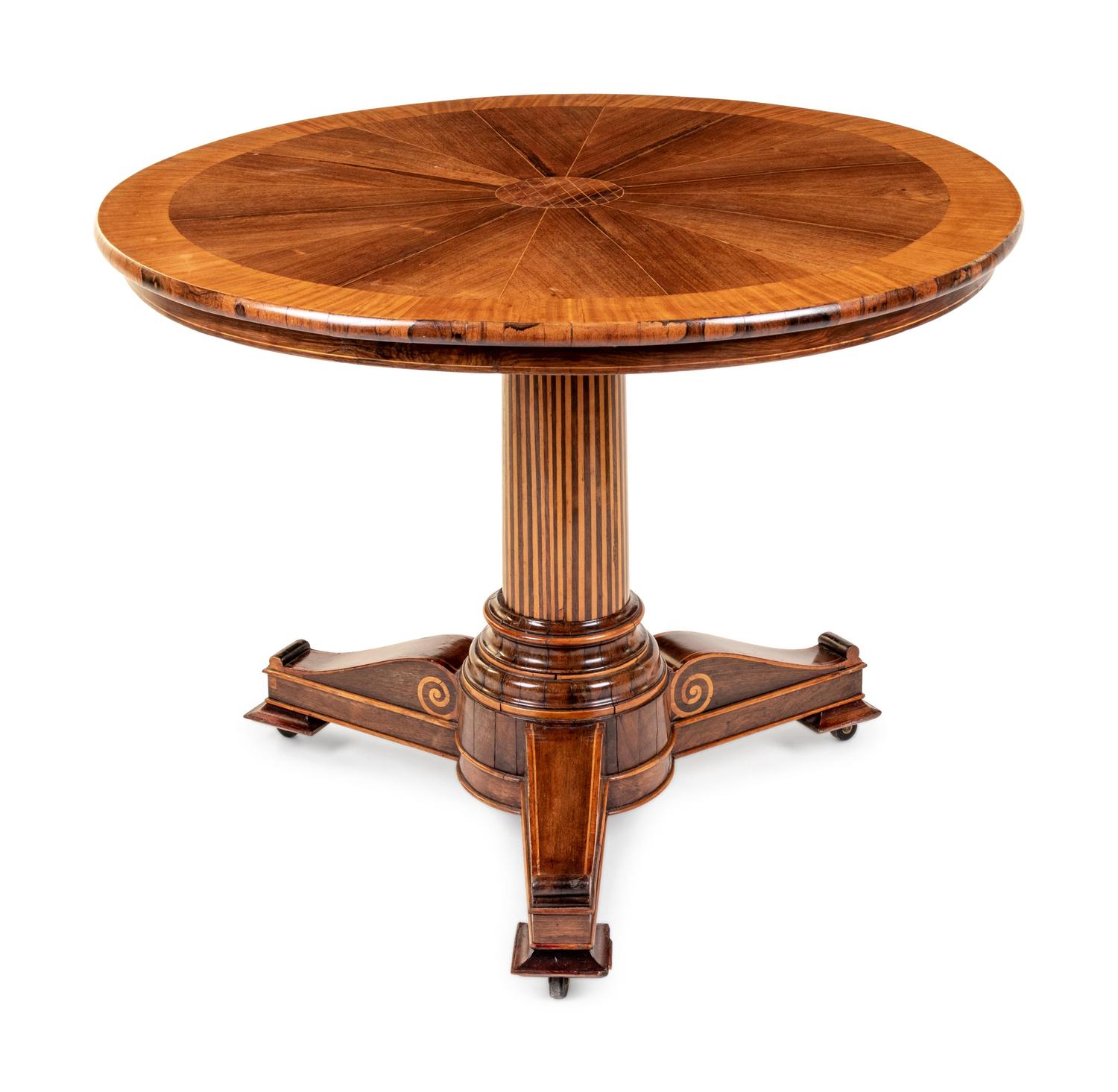 A Charles X Satinwood and Mahogany Center Table