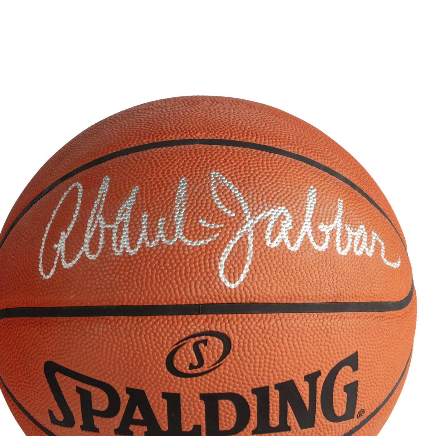 A Collection of Kareem Abdul-Jabbar and John Wooden Signed Autograph Basketballs