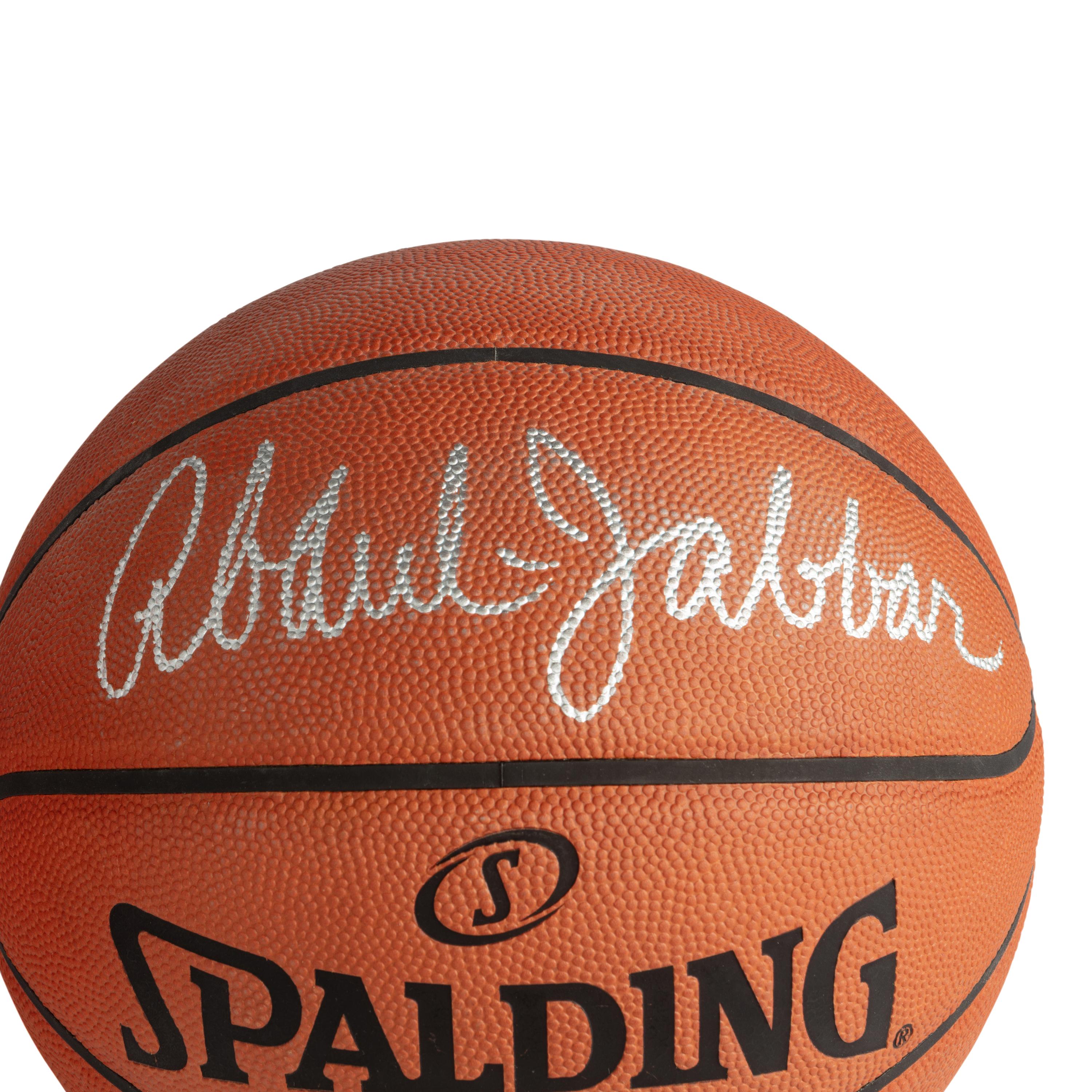 A Collection of Kareem Abdul-Jabbar and John Wooden Signed Autograph Basketballs