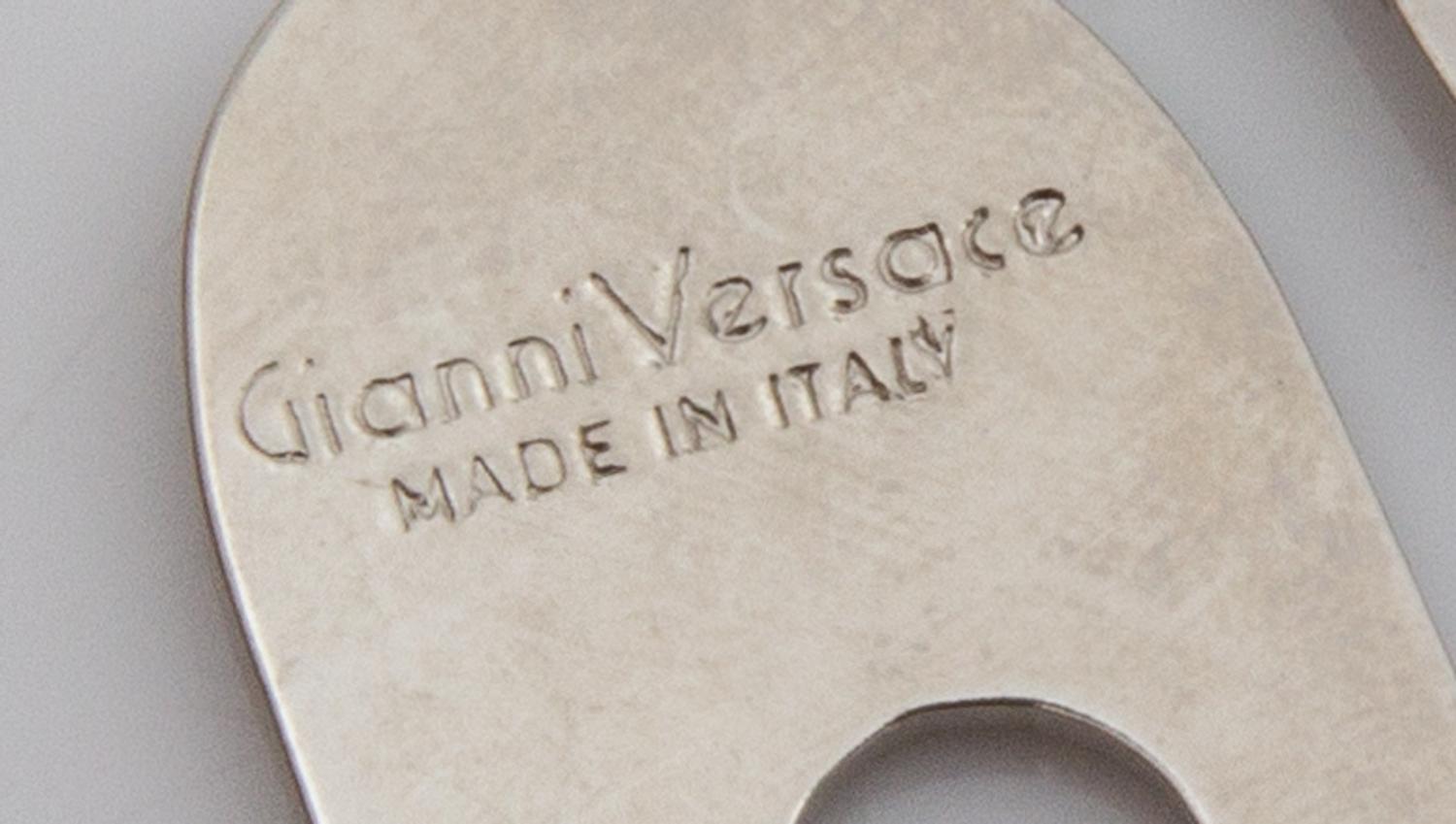 A Gianni Versace Geometric Lapel Pin, 4" x 3".