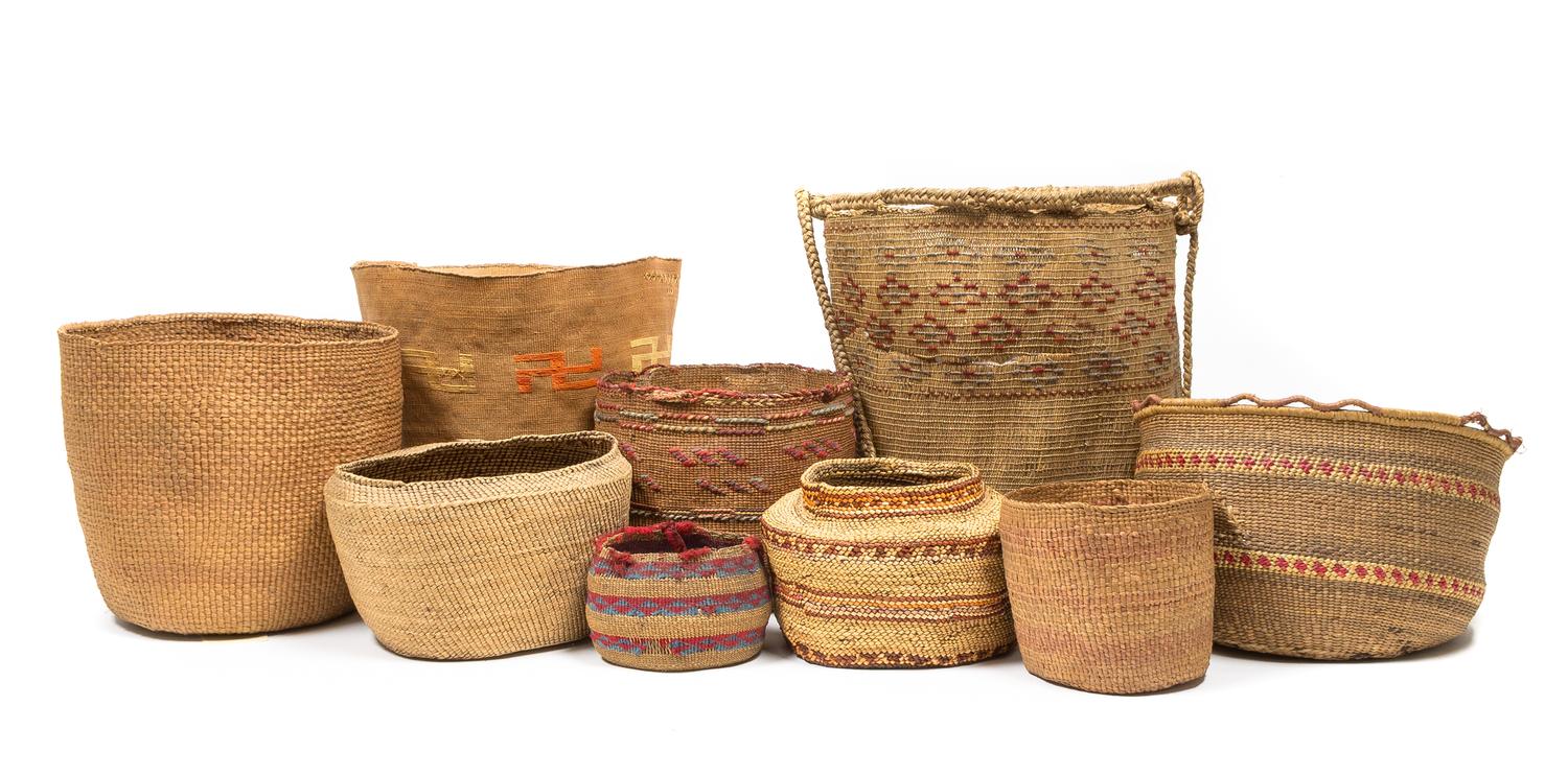 Nine Aleutian Chain/ Eskimo Baskets Height 8 3/4 x diameter 10 1/2 inches.