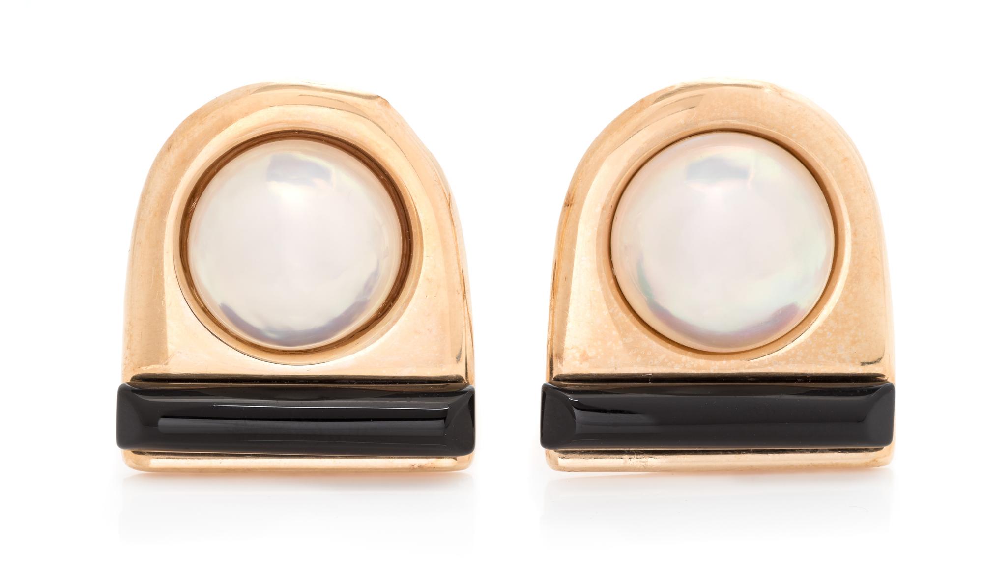 A Pair of 14 Karat Yellow Gold, Mabe Pearl and Onyx Earclips, 6.30 dwts.