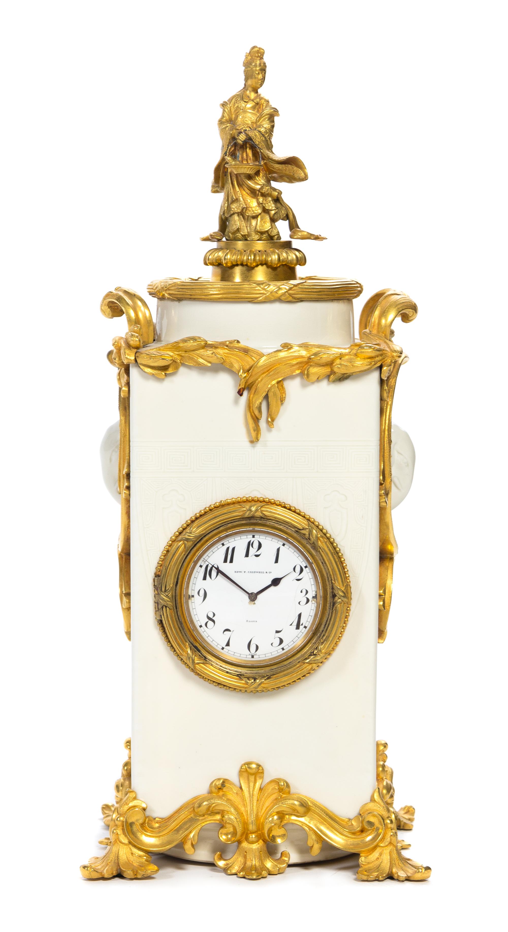 A French Gilt Bronze Mounted Blanc de Chine Mantel Clock Height 17 1/2 inches.