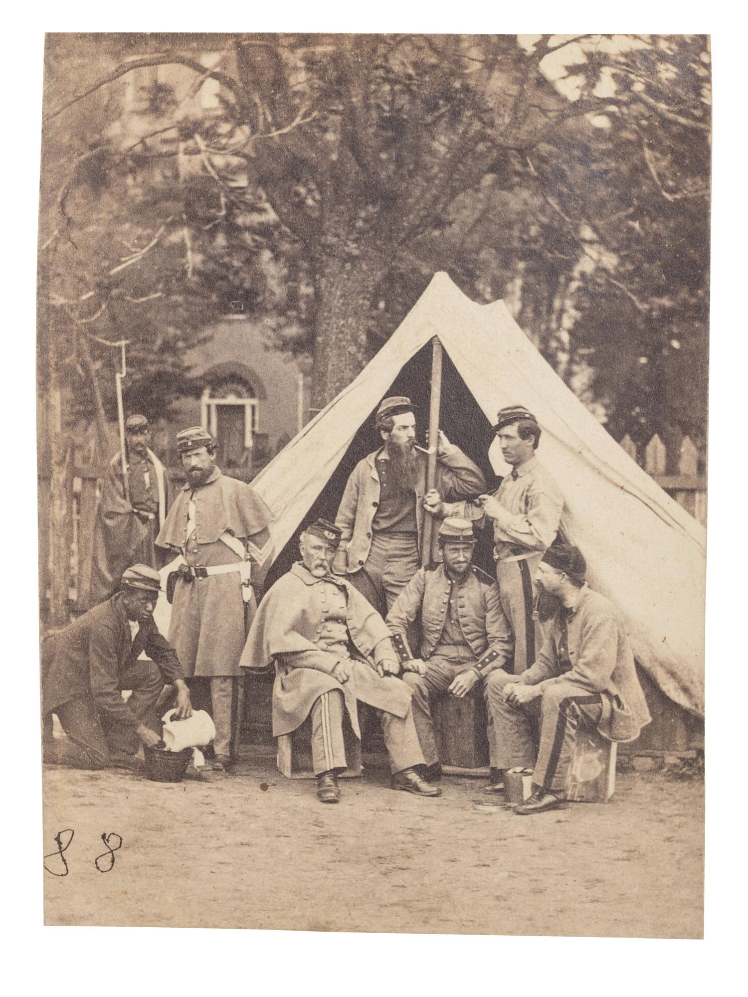 [CIVIL WAR]. 2 photographs of the 7th New York State Militia at Camp Cameron, incl. African American camp servants. Washington, 1861.