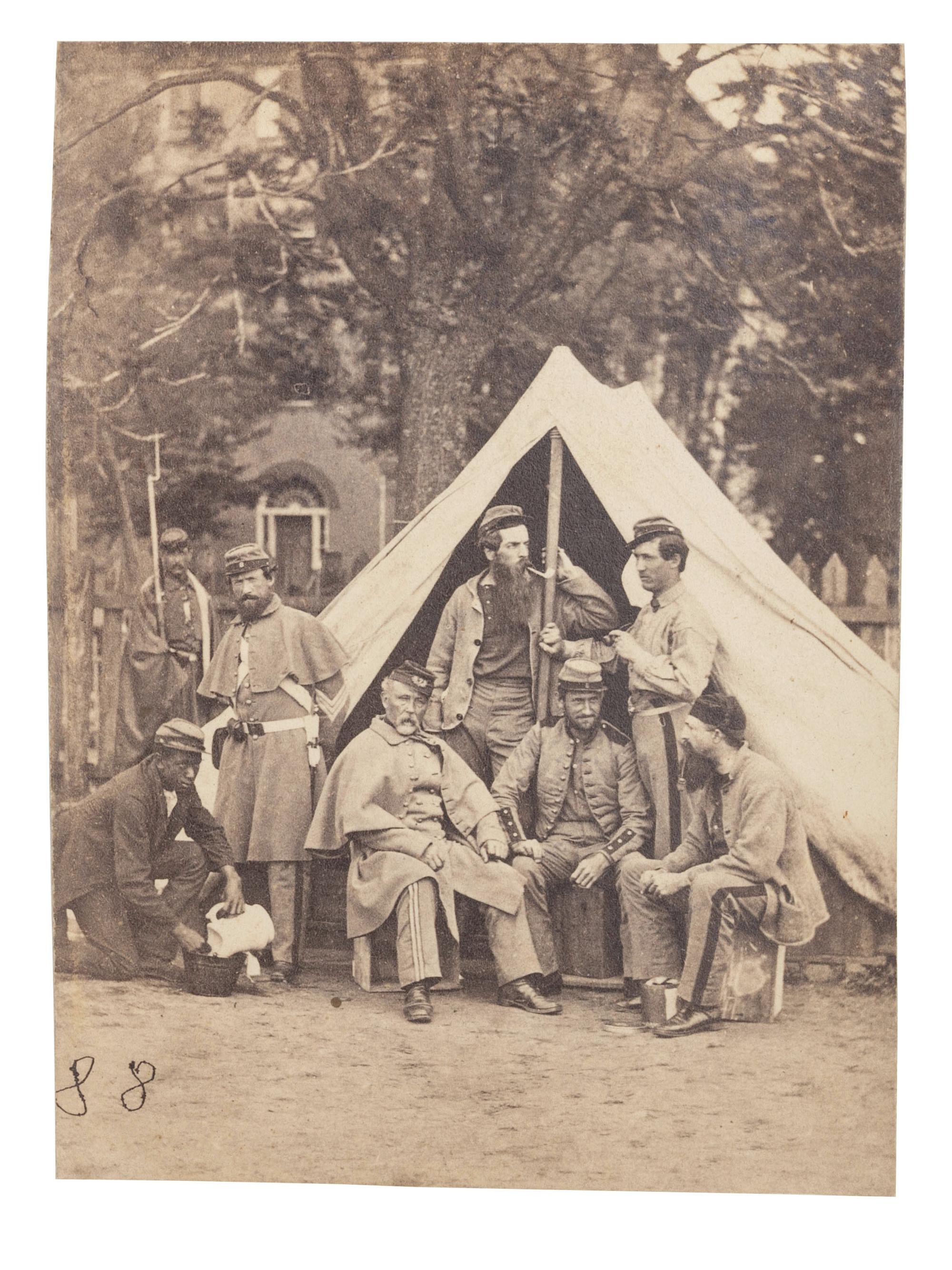 [CIVIL WAR]. 2 photographs of the 7th New York State Militia at Camp Cameron, incl. African American camp servants. Washington, 1861.