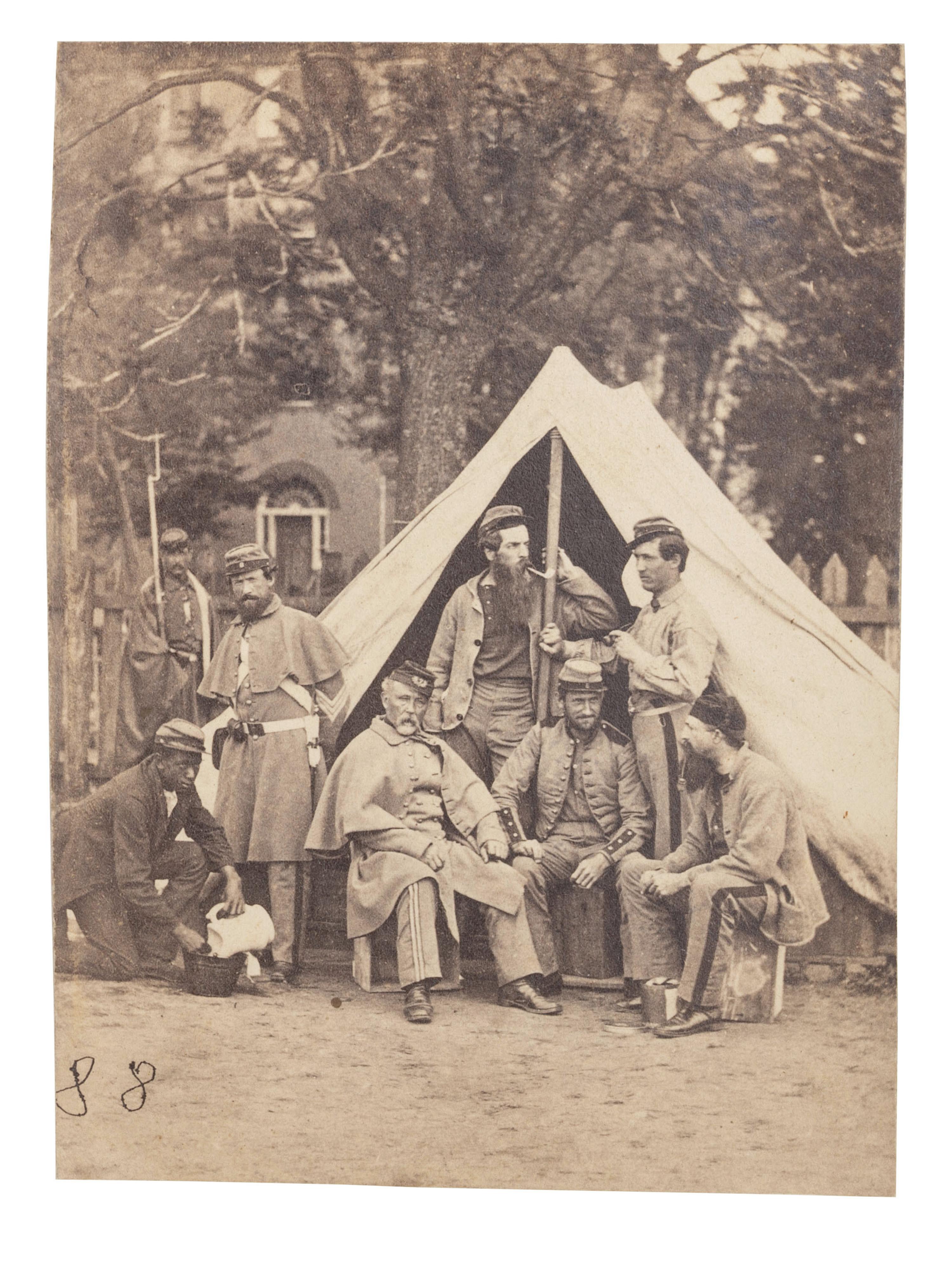 [CIVIL WAR]. 2 photographs of the 7th New York State Militia at Camp Cameron, incl. African American camp servants. Washington, 1861.