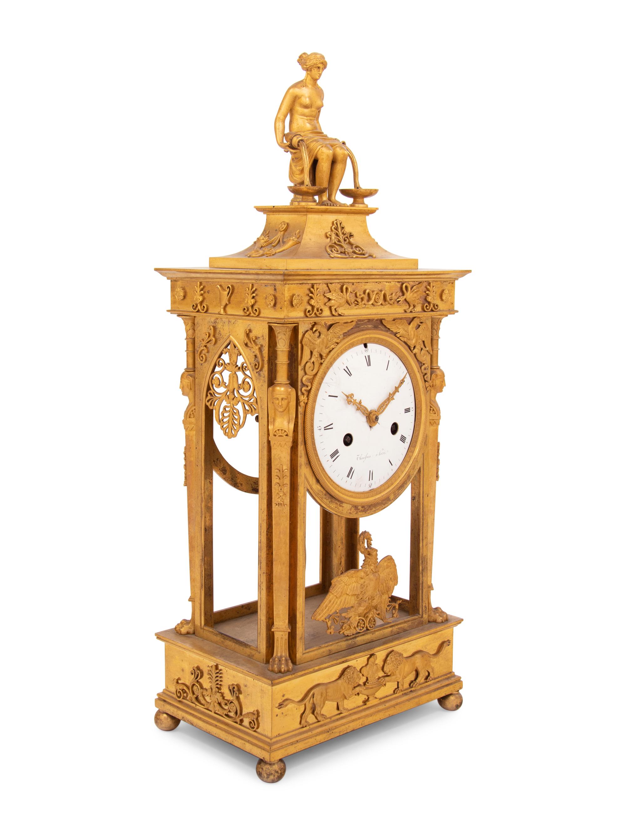 An Empire Gilt Bronze Figural Mantel Clock