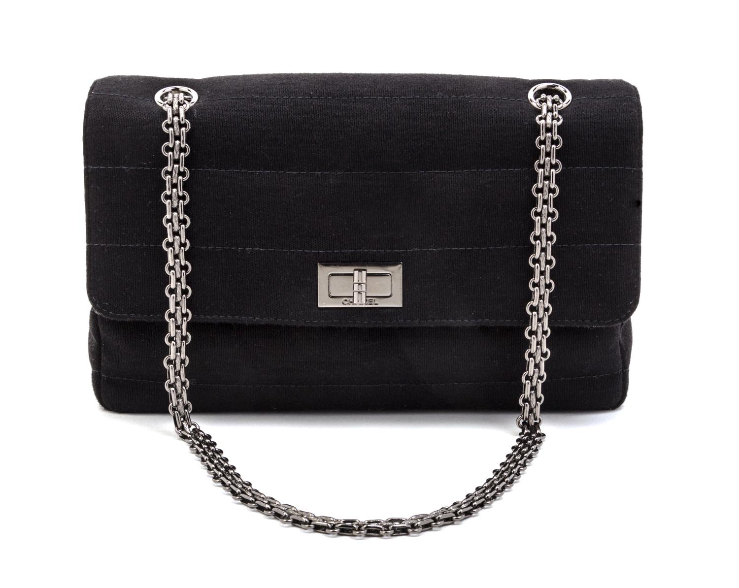 A Chanel Black Quilted Wool Jersey Flap Bag, 10 x 6 x 2 1/2 inches.