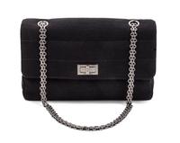 A Chanel Black Quilted Wool Jersey Flap Bag, 10 x 6 x 2 1/2 inches.