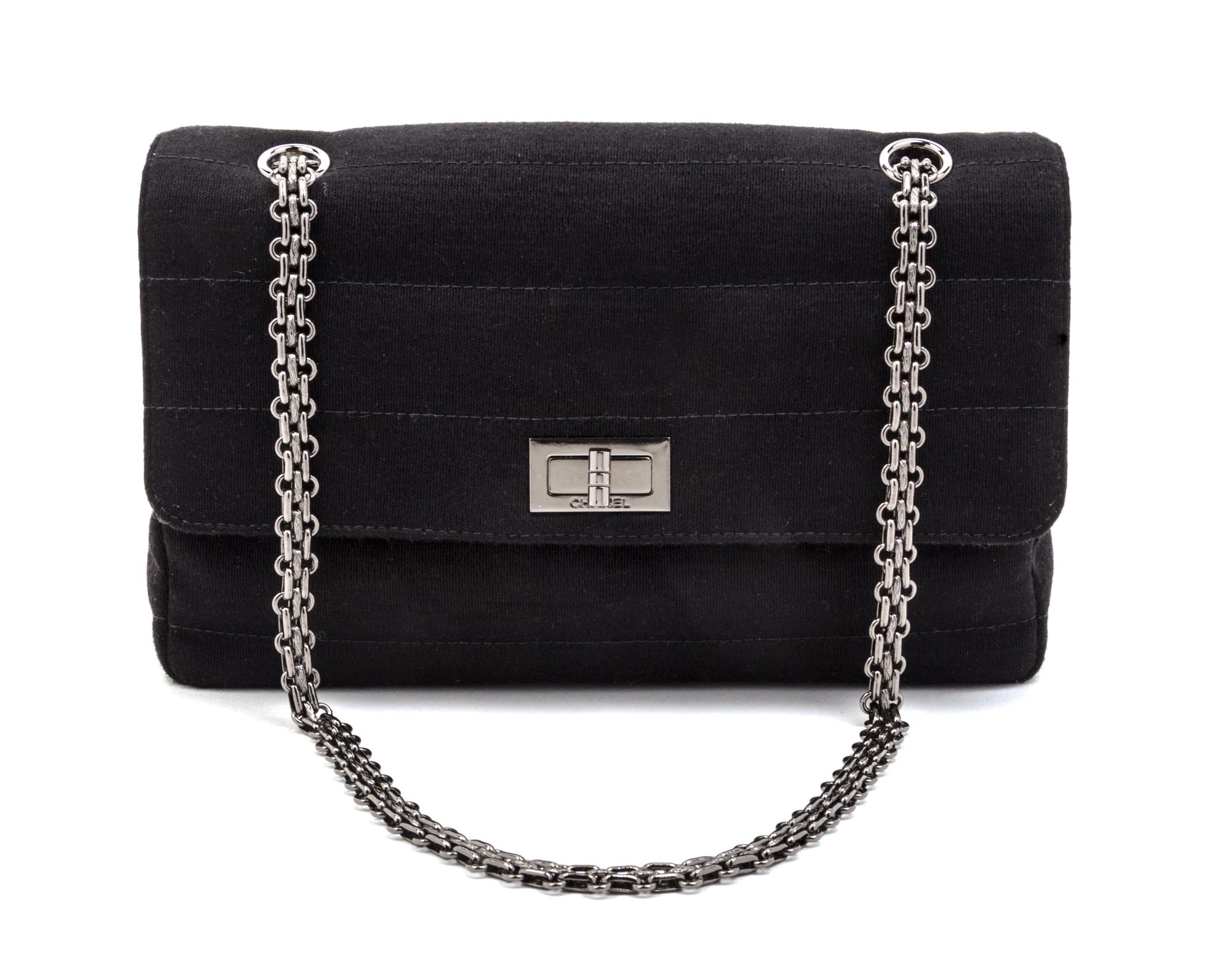 A Chanel Black Quilted Wool Jersey Flap Bag, 10 x 6 x 2 1/2 inches.