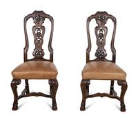 A Set of Six Continental Walnut Dining Chairs