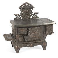 A Cast Iron Acme Child's Stove