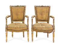 A Pair of Louis XVI Giltwood Fauteuils, Height 33 1/4 inches.