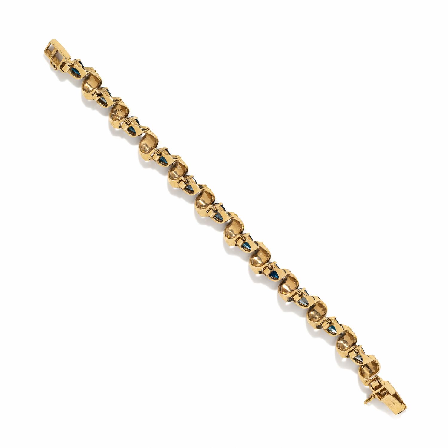 YELLOW GOLD AND BLUE TOPAZ BRACELET