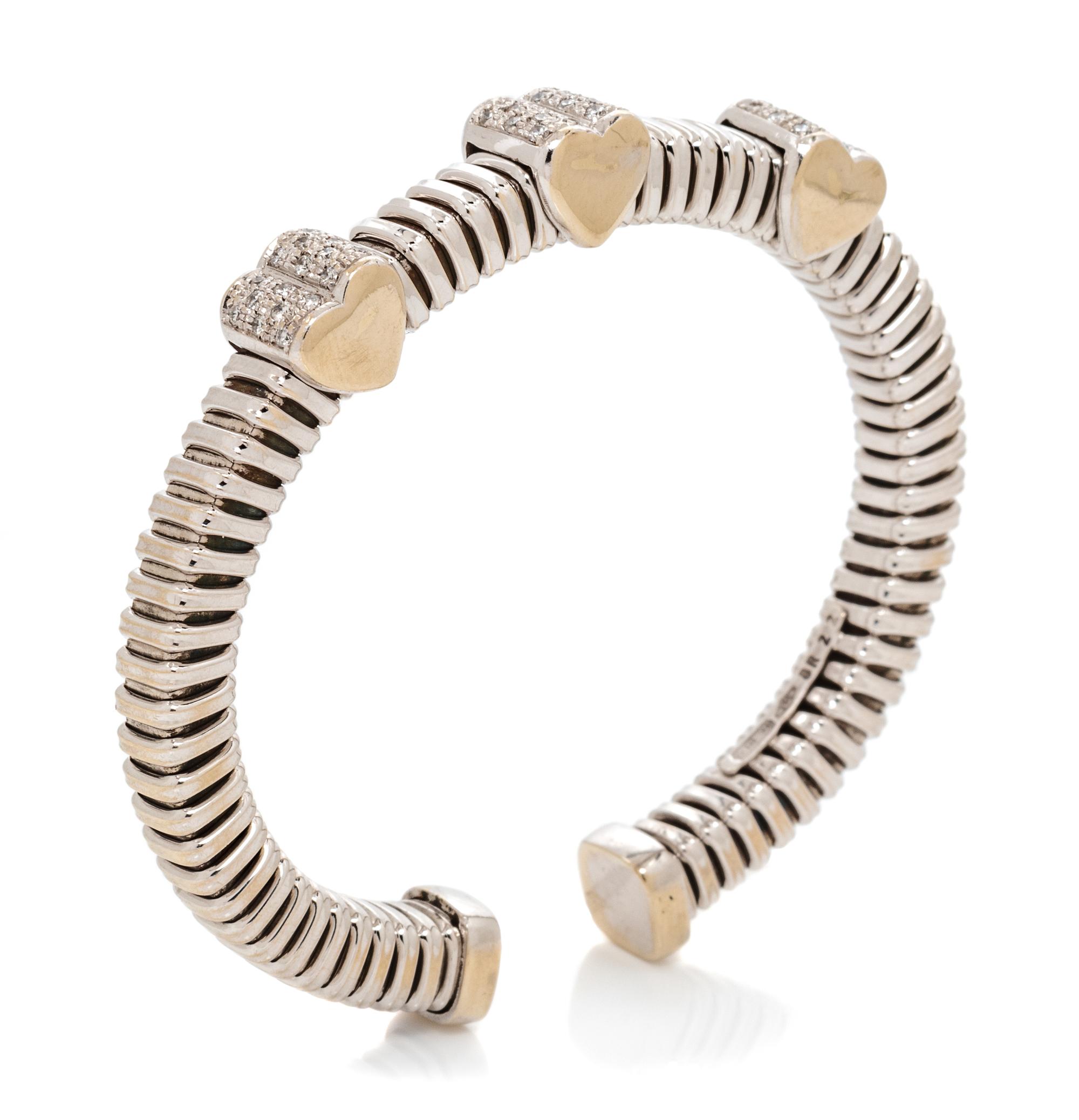 An 18 Karat Bicolor Gold and Diamond Heart Motif Cuff Bracelet, Italian, 21.00 dwts.