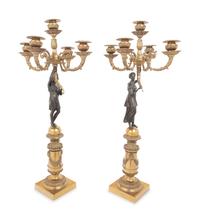 A Pair of Empire Style Gilt and Patinated Bronze Figural Five-Light Candelabra