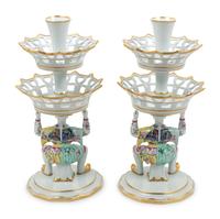 A Pair of Mottahedeh Parcel Gilt Tobacco Leaf Decorated Porcelain Figural Epergne