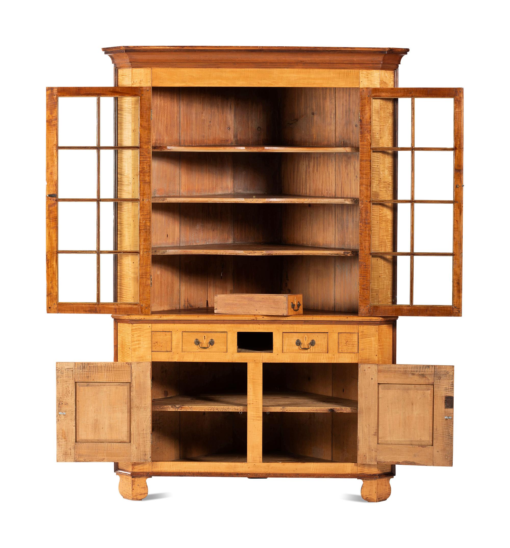 A Federal Style Tiger Maple Corner Cupboard