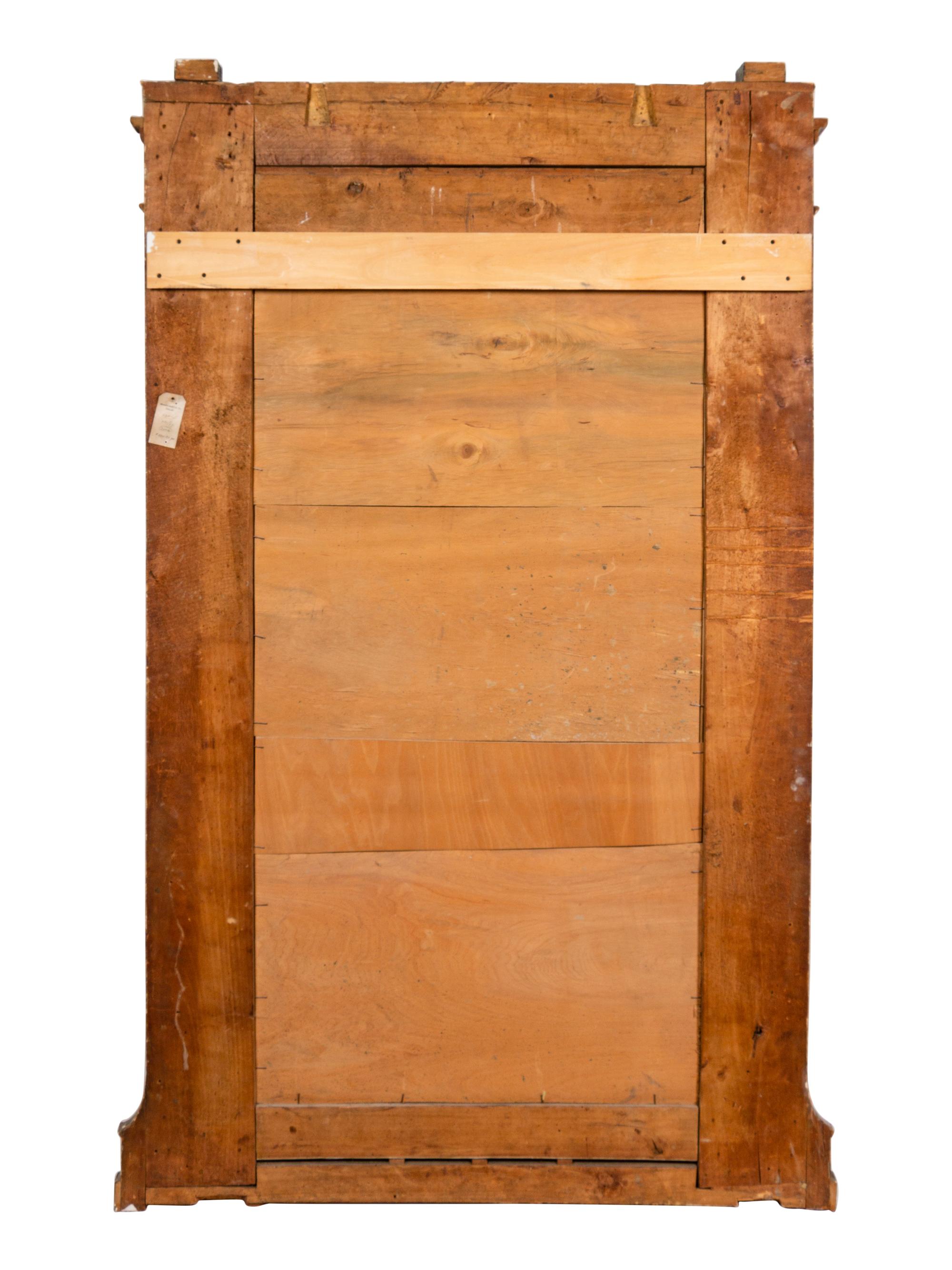 A Large Neoclassical Style Giltwood Mirror
